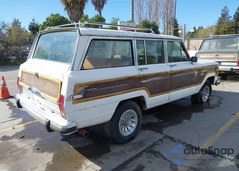1984 Jeep Grand Wagoneer z USA, uszkodzony, nr VIN 1JCNJ15N5ET107272